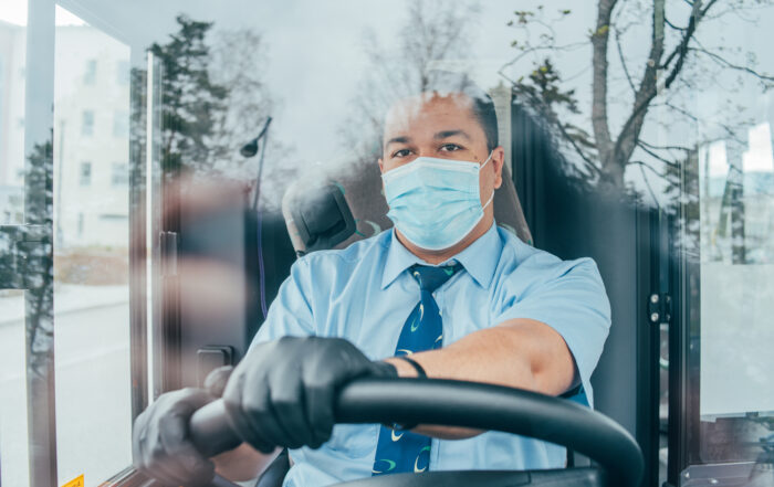 Public service workers like the bus driver here are among the most vulnerable to fentanyl exposure.